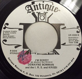 Dewayne (D.W.) Bowman And The I.R.S. (3) And Krissi : Victims Of The Pretty Things In Life / I'm Sorry (7")