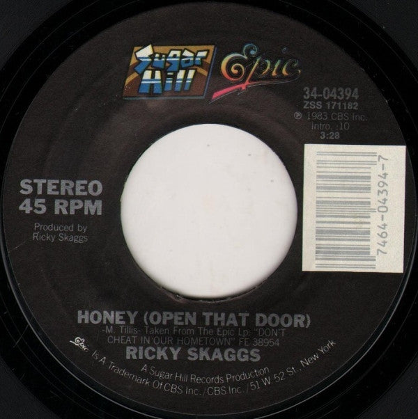 Ricky Skaggs : Honey (Open That Door) / She's More To Be Pitied (7")