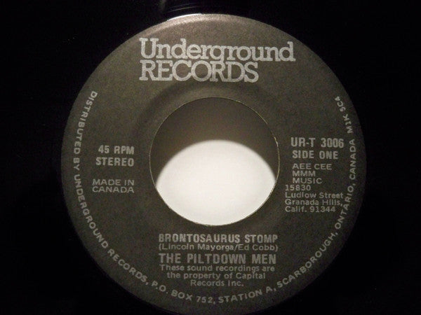 The Piltdown Men : Brontosaurus Stomp / Piltdown Rides Again (7", Single)