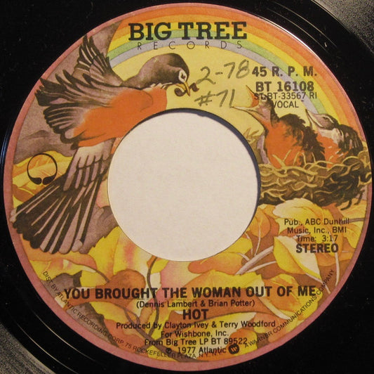Hot : You Brought The Woman Out Of Me (7", Single, Styrene, RI)